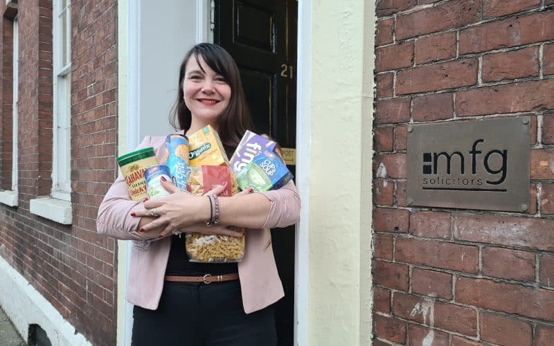 Law firm mfg Solicitors gives £1,000 festive foodbank donation