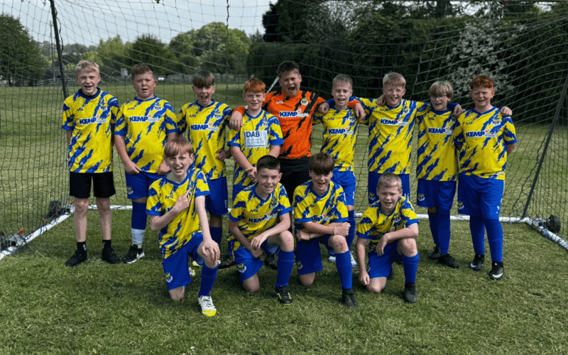 Local Business Backs Young Footballers and KEMP Hospice with New Team Sponsorship.